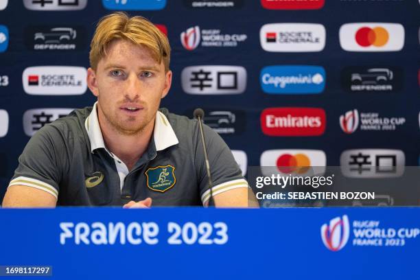 Australia's scrum-half Tate McDermott, answers questions during a press conference after the captain's run training session at Stade...