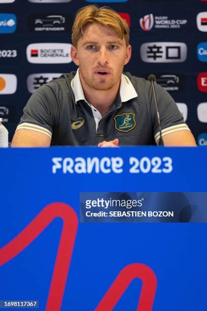 Australia's scrum-half Tate McDermott, answers questions during a press conference after the captain's run training session at Stade...