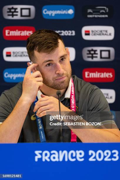 Australia's lock Nick Frost answers questions during a press conference after the captain's run training session at Stade Geoffroy-Guichard in...