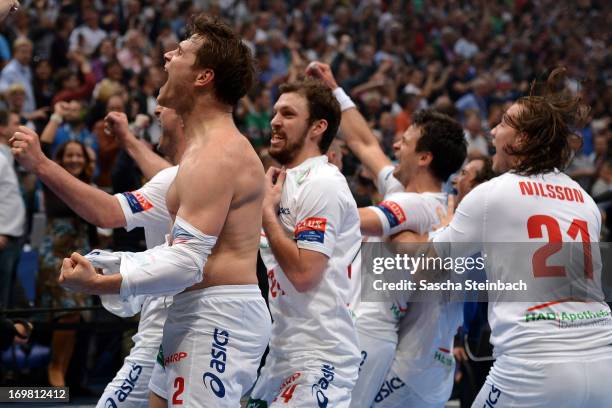 Players of Hamburg celebrate the championship after the EHF Final Four final match between FC Barcelona Intersport and HSV Hamburg at Lanxess Arena...