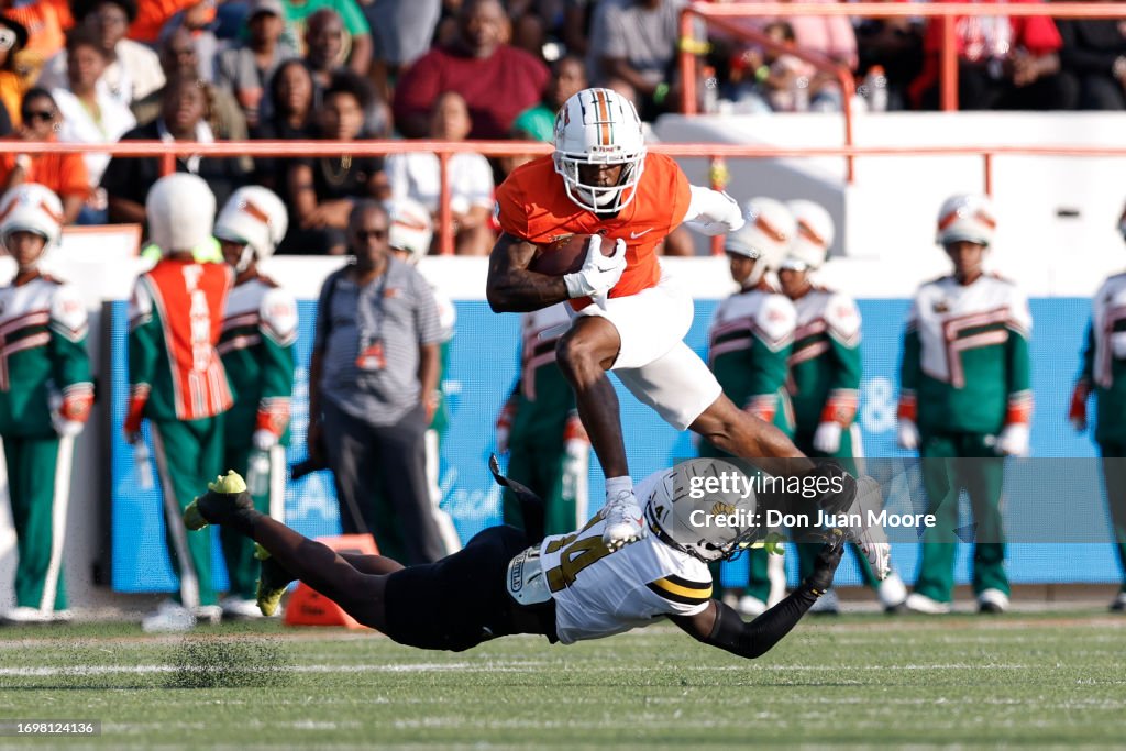 Florida Versus Riley Wide Receiver Marcus Riley of the Florida A&M Rattlers leaps over ...