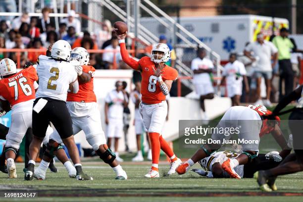 Quarterback Jeremy Moussa of the Florida A&M Rattlers on a pass play during the game against the Alabama State Hornests at Bragg Memorial Stadium on...