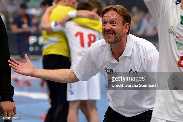 Head coach Martin Schwalb of Hamburg celebrates the championship after the EHF Final Four final match between FC Barcelona Intersport and HSV Hamburg...