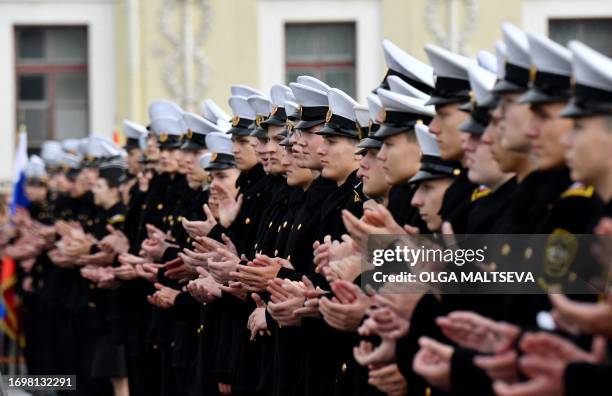 Cadets of the Admiral Makarov State University of sea and river fleet take part in the cadet initiation ceremony on Dvortsovaya Square in Saint...