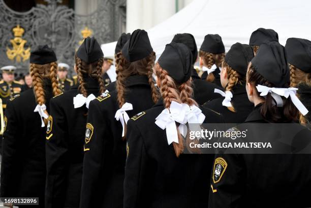 Cadets of the Admiral Makarov State University of sea and river fleet take part in the cadet initiation ceremony on Dvortsovaya Square in Saint...