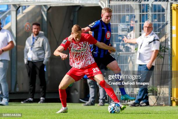 Maximilian Breunig of SC Freiburg II and Laurent Jans of Waldhof Mannheim battle for the ball during the 3. Liga match between Waldhof Mannheim and...