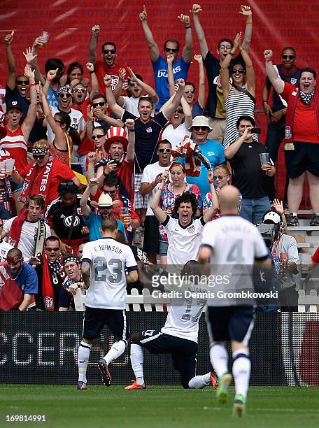 Jozy Altidore of the United States celebrates scoring his side's opening goal in front of their fans during the International Friendly match between...
