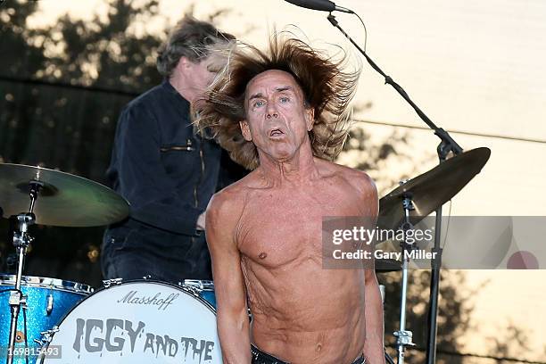 Scott Asheton and Iggy Pop of Iggy and the Stooges perform in concert during the Free Press Summer Festival at Eleanor Tinsley Park on June 1, 2013...