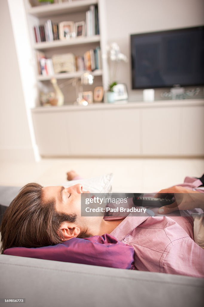 Man sleeping on sofa