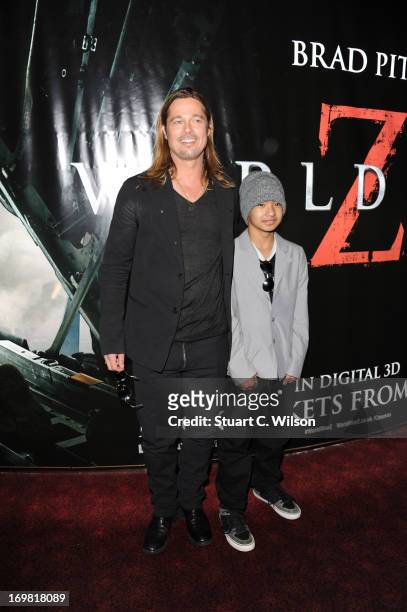 Brad Pitt and Maddox Jolie-Pitt attend the World Premiere of 'World War Z' at The Empire Cinema on June 2, 2013 in London, England.
