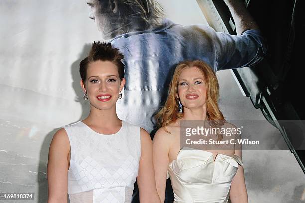 Daniella Kertesz and Mireille Enos attend the World Premiere of 'World War Z' at The Empire Cinema on June 2, 2013 in London, England.