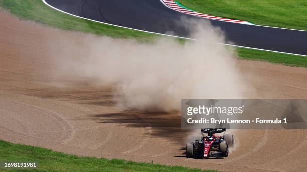 Valtteri Bottas of Finland driving the Alfa Romeo F1 C43 Ferrari runs wide into the gravel during the F1 Grand Prix of Japan at Suzuka International...
