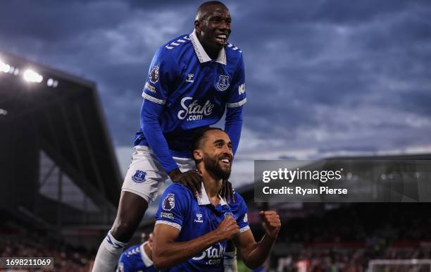 Dominic Calvert-Lewin of Everton celebrates with team mate Abdoulaye Doucoure after scoring their sides third goal during the Premier League match...