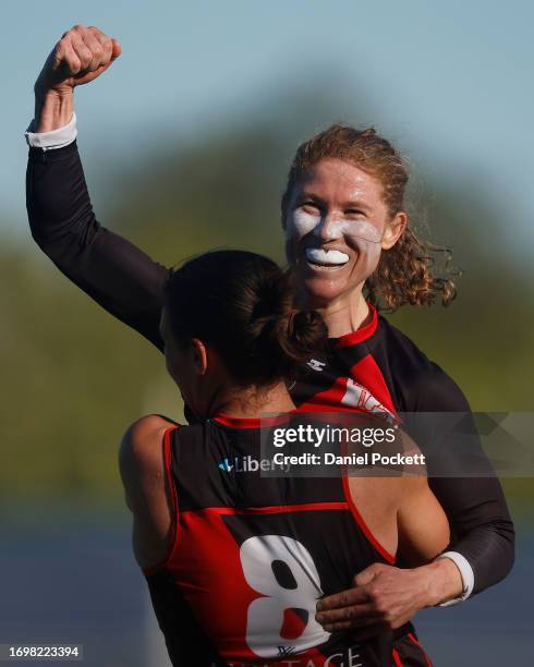 Georgia Nanscawen of the Bombers celebrates kicking a goal during the round four AFLW match between Essendon Bombers and Fremantle Dockers at Windy...