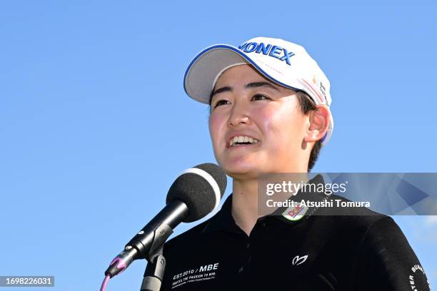Akie Iwai of Japan is interviewed after winning the tournament following the final round of 50th Miyagi TV Cup Dunlop Ladies Open Golf Tournament at...