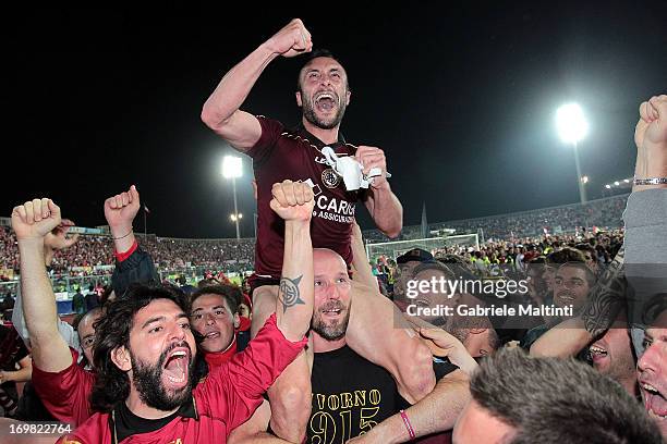 Andrea Luci of AS Livorno celebrates after winning promotion to the Serie A during the Serie B playoff final match between AS Livorno and Empoli FC...