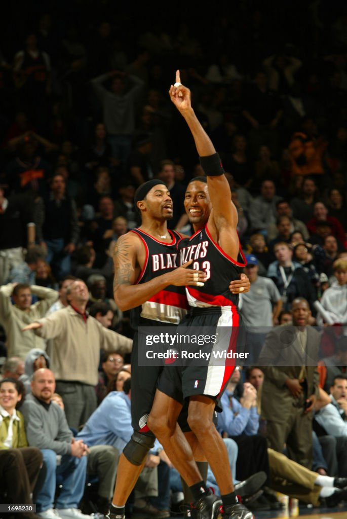 Pippen and Wallace celebrate