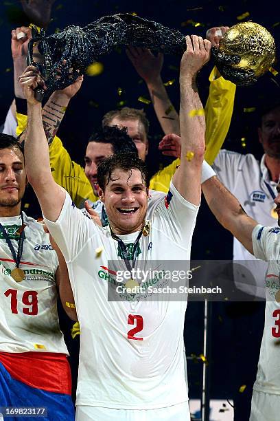 Michael Kraus of Hamburg celebrates with the trophy after the EHF Final Four final match between FC Barcelona Intersport and HSV Hamburg at Lanxess...