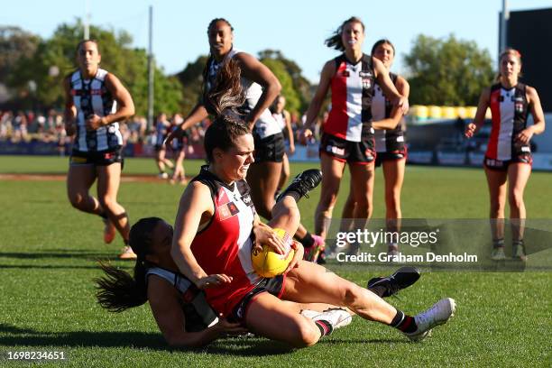 Olivia Vesely of the Saints is tackled during the round four AFLW match between St Kilda Saints and Collingwood Magpies at RSEA Park, on September 24...