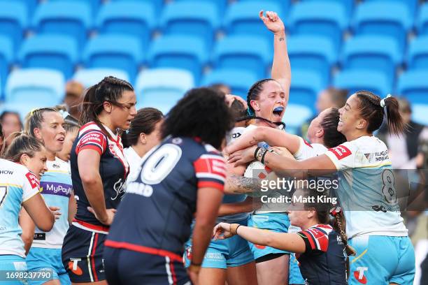 Brittany Breayley-Nati of the Titans celebrates with team mates after scoring a try during the NRLW Semi Final match between Sydney Roosters and Gold...