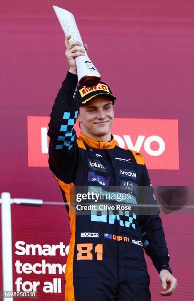 Third placed Oscar Piastri of Australia and McLaren celebrates on the podium during the F1 Grand Prix of Japan at Suzuka International Racing Course...