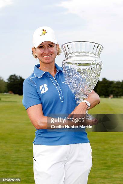 Karrie Webb of Australia holds the championship trophy after winning the ShopRite LPGA Classic Presented by Acer at Stockton Seaview Hotel and Golf...