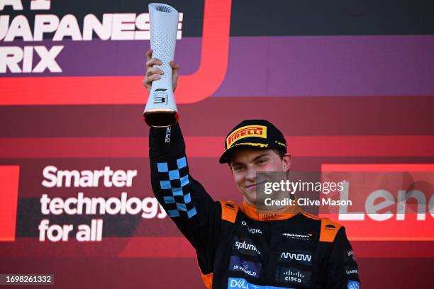 Third placed Oscar Piastri of Australia and McLaren celebrates on the podium during the F1 Grand Prix of Japan at Suzuka International Racing Course...