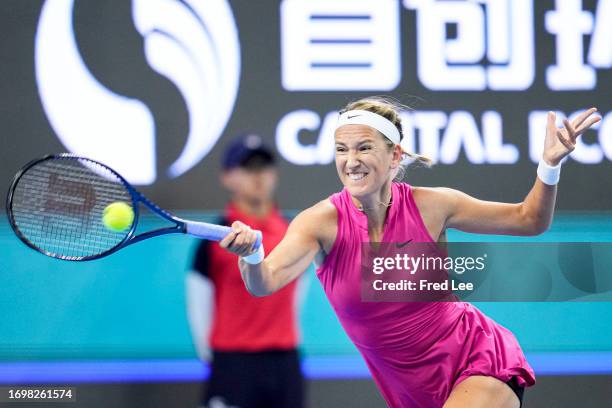 Victoria Azarenka of Belarus in action during a match against Magda Linette of Poland during day 5 of the 2023 China Open at National Tennis Center...
