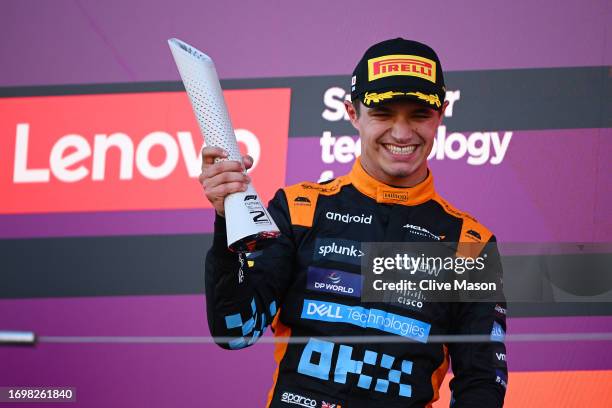 Second placed Lando Norris of Great Britain and McLaren celebrates on the podium during the F1 Grand Prix of Japan at Suzuka International Racing...