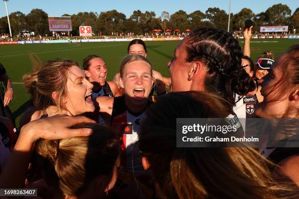 The Saints celebrate victory in the round four AFLW match between St Kilda Saints and Collingwood Magpies at RSEA Park, on September 24 in Melbourne,...