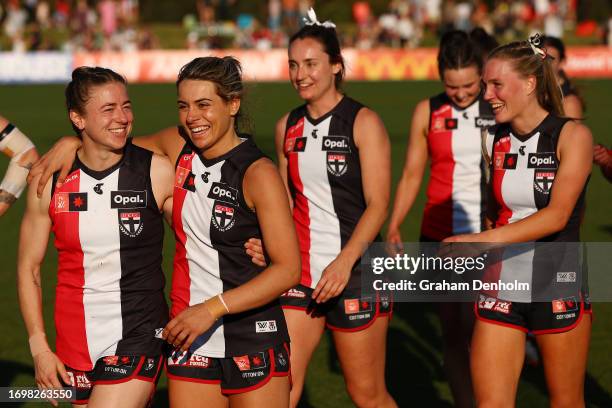 The Saints celebrate victory in the round four AFLW match between St Kilda Saints and Collingwood Magpies at RSEA Park, on September 24 in Melbourne,...