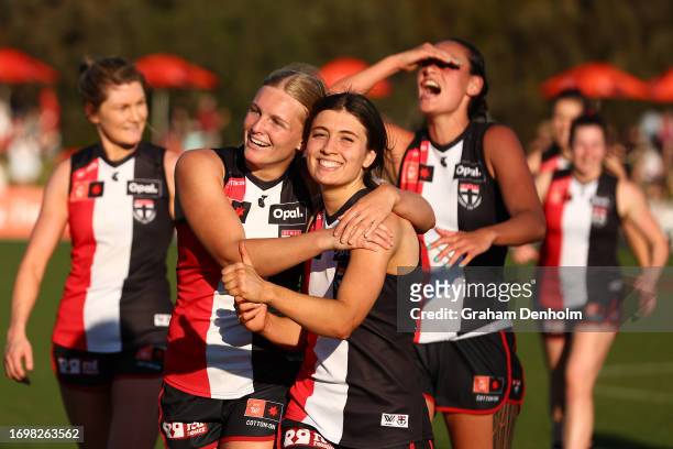 The Saints celebrate victory in the round four AFLW match between St Kilda Saints and Collingwood Magpies at RSEA Park, on September 24 in Melbourne,...