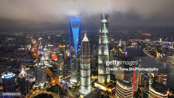 aerial lujiazui night skyline with low-hanging clouds view, shanghai, china - ifc center stock pictures, royalty-free photos & images