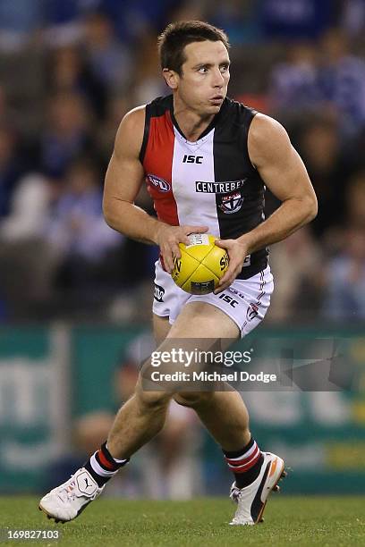 Stephen Milne of the Saints runs with the ball during the round ten AFL match between the North Melbourne Kangaroos and the St Kilda Saints at Etihad...