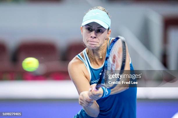 Magda Linette of Poland in action during a match against Victoria Azarenka of Belarus during day 5 of the 2023 China Open at National Tennis Center...