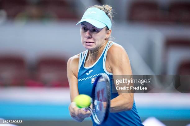 Magda Linette of Poland in action during a match against Victoria Azarenka of Belarus during day 5 of the 2023 China Open at National Tennis Center...