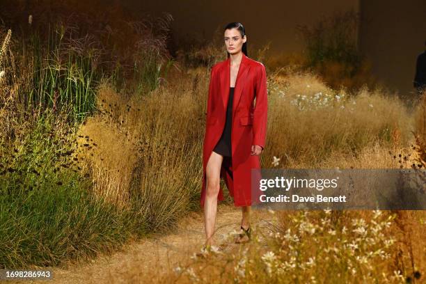 Model walks the runway at the Hermès SS24 Women's Ready-to-Wear Show at La Garde Républicaine on September 30, 2023 in Paris, France.