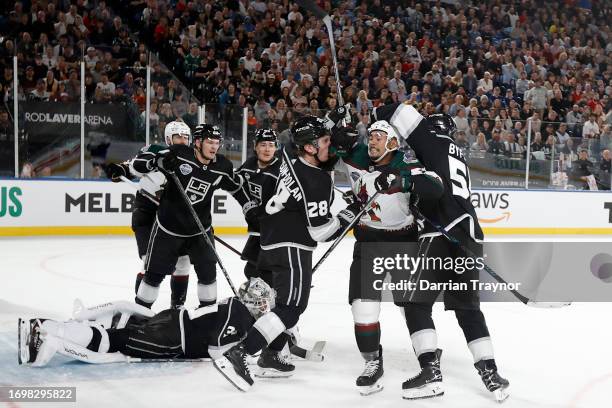 Players fight during the NHL Global Series match between Arizona Coyotes and Los Angeles Kings at Rod Laver Arena on September 24, 2023 in Melbourne,...