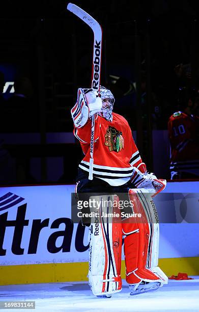 Goaltender Corey Crawford of the Chicago Blackhawks acknowledges the fans after being selected star number three of Game Two of the Western...