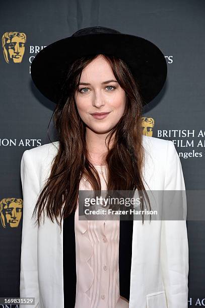 Actress Dakota Johnson attends the 26th Annual BAFTA LA Garden Party at the British Consuls General Residence on June 2, 2013 in Los Angeles,...