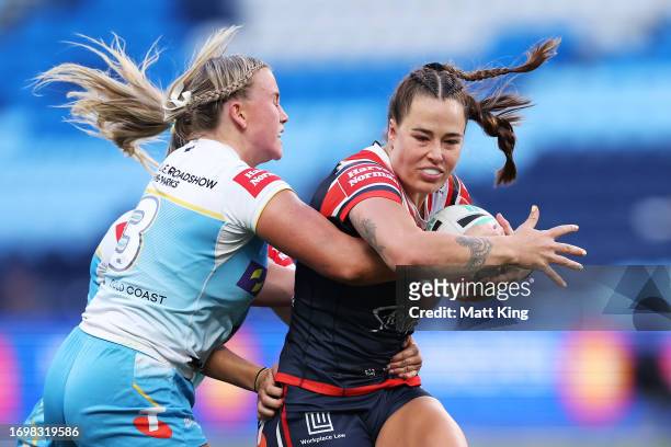 Isabelle Kelly of the Roosters runs with the ball uring the NRLW Semi Final match between Sydney Roosters and Gold Coast Titans at Allianz Stadium,...