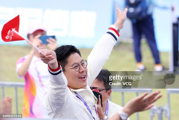 Kenneth Fok Kai-kong, head of the Hong Kong delegation, looks on during the Rowing - Men's Pair Final A on day one of the 19th Asian Games at Fuyang...