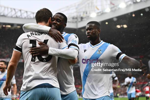 Joachim Andersen of Crystal Palace celebrate with Jeffrey Schlupp and Marc Guehi after scoring a goal during the Premier League match between...