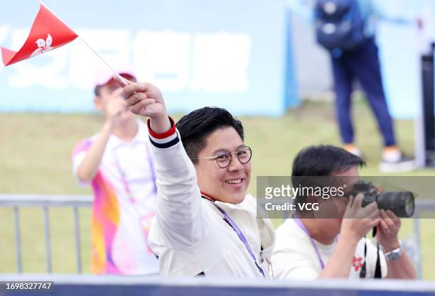 Kenneth Fok Kai-kong, head of the Hong Kong delegation, looks on during the Rowing - Men's Pair Final A on day one of the 19th Asian Games at Fuyang...