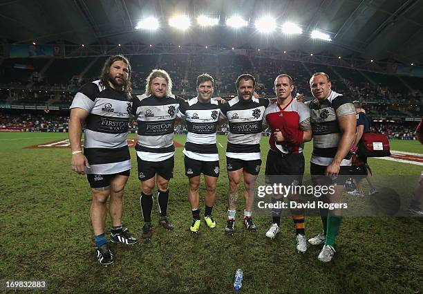 The Barbarians front row Martin Castrogiovanni, Duncan Jones, Schalk Brits,Andrea Lo Cicero, Paul James and Leonardo Ghiraldini pose after the match...