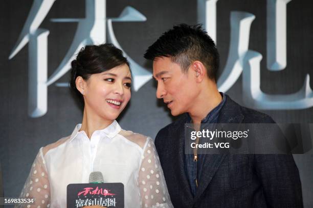 Actor Andy Lau and actress Zhang Jingchu attend "Switch" press conference at Olympic Sports Center on June 2, 2013 in Beijing, China.