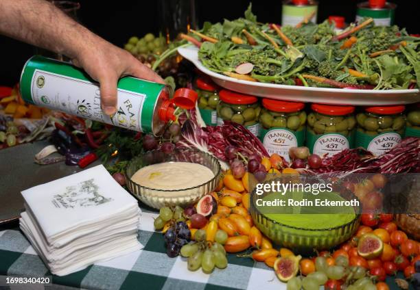 Frankies 457 Spuntino Extra Virgin Olive Oil is drizzled at Los Angeles Launch on September 23, 2023 in Los Angeles, California.