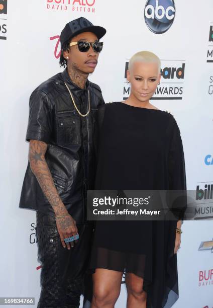 Rapper Wiz Khalifa and actress Amber Rose arrive at the 2013 Billboard Music Awards at the MGM Grand Garden Arena on May 19, 2013 in Las Vegas,...