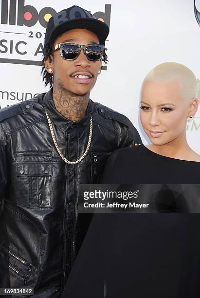 Rapper Wiz Khalifa and actress Amber Rose arrive at the 2013 Billboard Music Awards at the MGM Grand Garden Arena on May 19, 2013 in Las Vegas,...