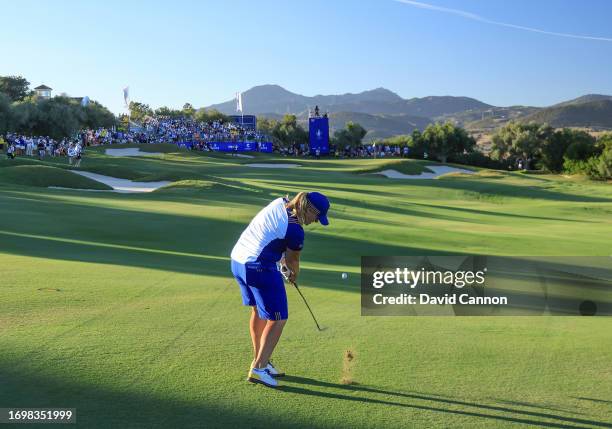 Caroline Hedwall of The European Team plays her third shot on the 18th hole in her match with Anna Nordqvist against Angel Yin and Cheyenne Knight...